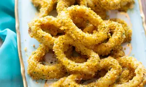 Anelli di totani dorati e croccanti, perfetti per le tue totani ricette. Un antipasto sfizioso e facile da preparare.